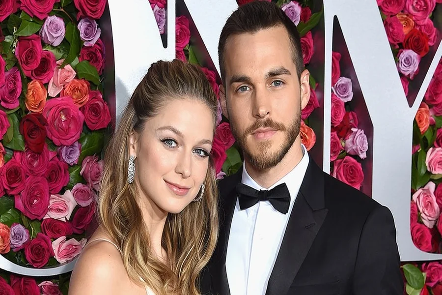 Melissa Benoist and Chris Wood